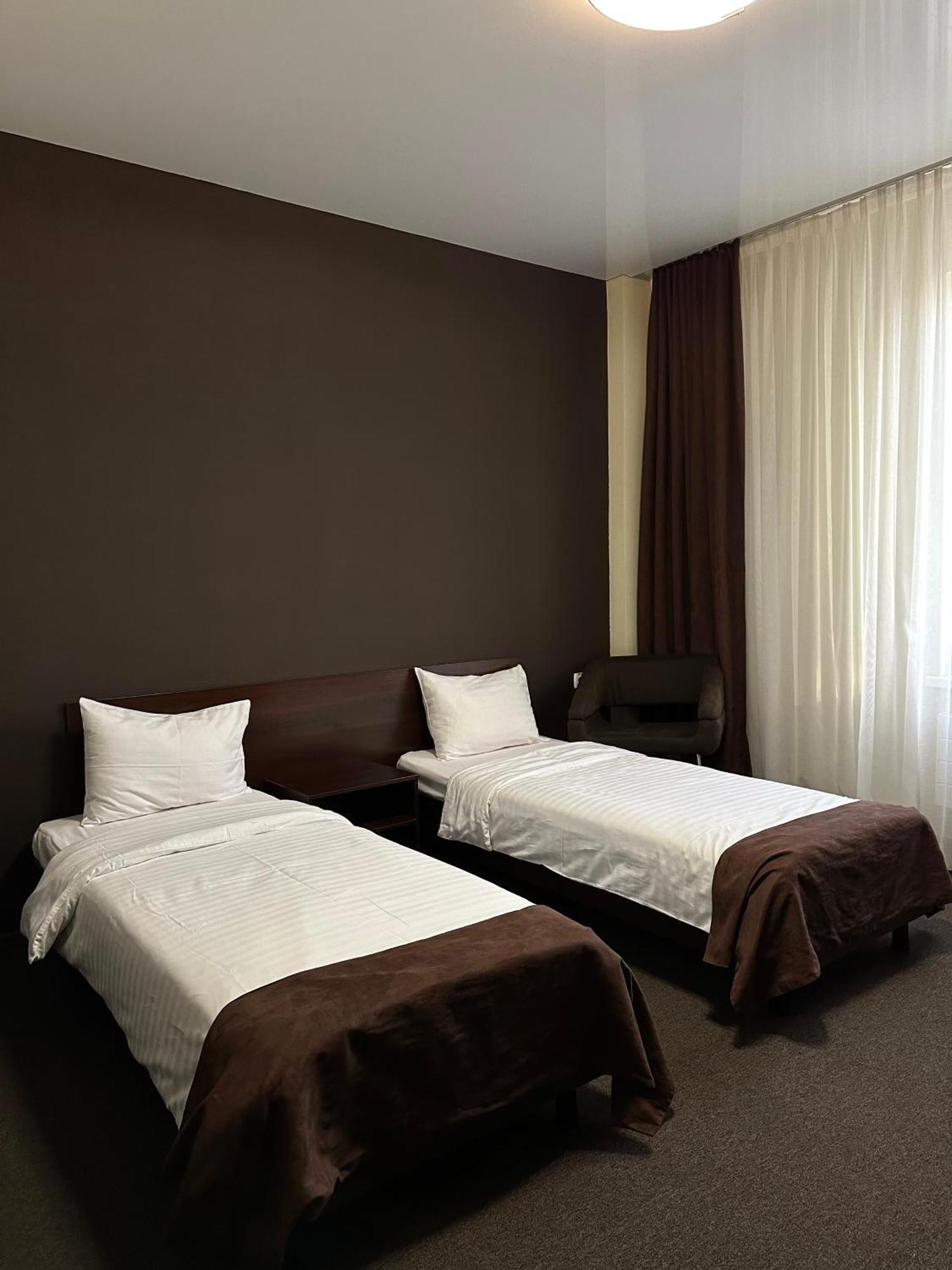 Hotel Atmosphere Poltava Szoba fotó